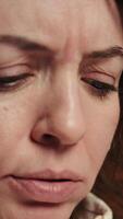 Vertical Upset teleworking engineer worried after failing to secure company servers from virus attacks, close up. Anxious woman stressed about being unable to build firewalls protecting data, camera B video