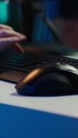Vertical Technician doing software quality assurance, reading source code on PC before implementing it. IT admin inspecting coding on computer, looking to fix potential issues, camera A close up video