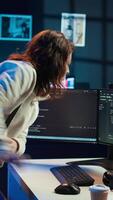 Vertical Computer scientist arriving in home office, ready to design and develop software applications. IT expert starting job shift, implementing and maintaining company systems, camera B video