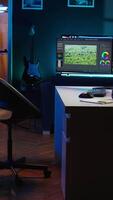 Vertical editor arrives at work, ready to start analyzing film montage color grading and lighting. Post production studio employee starts shift in creative office, working with raw footage, camera B video