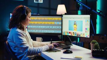 Photo editor using graphic tablet to edit images lighting, delivering visually appealing final product, listening podcasts. Freelancer wearing audio headset, browsing through photographs, camera B video