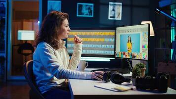 Photographer using professional photo editing tools on PC display. Photo editor utilizing high tech photographs retouching application to make adjustments using computer screen, camera B video