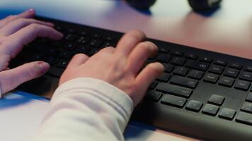 Computer technician working from home, designing and developing software applications, close up. IT specialist typing on PC keyboard, implementing and maintaining company systems, camera A video