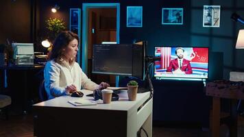 Teleworking system administrator futureproofing company network from downtimes and unexpected failures. Remote IT employee typing on keyboard, increasing data security, camera B video