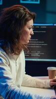 Vertical Programmer closing backpack, leaving home office after filtering malicious traffic from cybercriminals. Woman finishing job shift after being done with preventing malware, camera B video