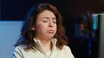 Angry programmer feeling frustration after failing to secure company servers from virus attacks. Irritated woman releasing pent up emotions, unable to build firewalls protecting data, camera A video