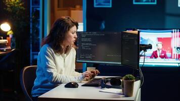 Programmer doing software quality assurance, stretching arms behind back after reading source code, feeling fatigued. IT expert takes break from work to relax muscles after inspecting coding, camera A video