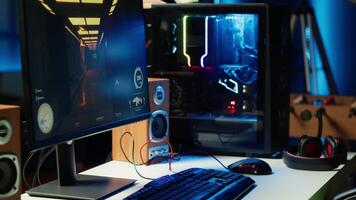 RGB lights illuminated fans on gaming computer capable of playing latest games, close up shot, empty apartment. Focus of components on powerful desktop PC in home living room video
