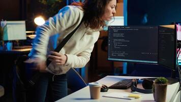 Computer scientist arriving in home office, ready to design and develop software applications. IT expert starting job shift, implementing and maintaining company systems, camera A video