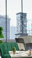Vertical Empty global corporation office in a luxurious urban city center, modern workspace equipped with professional tools and networking system. Career development and motivation. video