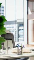 Vertical Empty high end corporation workspace with modern tools and gadgets that serve in the business industry. Corporate culture concept, career development with executive power. video