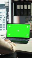 Vertical Woman chief executive officer working with mockup copy space screen on device, developing a project for enterprise growth and objectives achievement. Female director with determination. Camera A. video