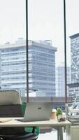 Vertical Empty business office equipped with modern tools to serve a corporation, workspace in a high end city center corporation. Global enterprise work environment, corporate culture. video