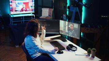 Software engineer teacher doing online tutoring, talking with student in online videocall about ways to do debugging. IT master teaching apprentice in webinar how to write code, camera B video