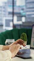 Vertical Powerful female leader evaluates a strategic review of the company activity, analyzing market trends and setting new priorities. Ensuring the enterprise objectives achievements. Camera B. video