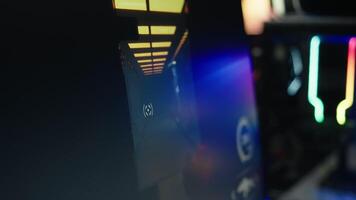 Computer screen showing FPS videogame with futuristic weapon shooting laser bullets at flying robots. Extreme close up of POV shooting videogame on PC in living room with no people in video