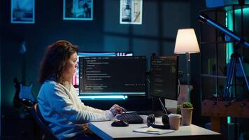 Cybersecurity expert using computer and augmented reality to look for company security vulnerabilities and injected malware. Programmer installing code on PC, looking at AR visualization, camera A video