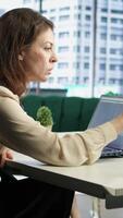 Vertical Determined woman director developing a new business plan, showcasing her expertise in target analysis, strategic thinking and commitment to achieving company objectives. Decision making. Camera A. video