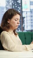 Vertical Business entrepreneur signing contracts and documents to approve the next activity for enterprise management and development. Female CEO working on legal paperwork, authorization. Camera A. video