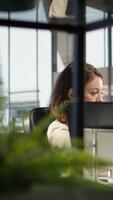 Vertical Powerful female entrepreneur focuses on strategic planning, setting a clear vision and goals for the corporation and aligning resources to achieve growth. Ambition and determination. Camera B. video