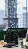 Vertical Forecast expert CEO analyzing investment insights and negotiations details, looking at data analytics and reports to establish the corporation vision and objectives. Business productivity. Camera B. video