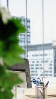 Vertical Empty urban corporate high end office designed for a person with authority, analytics and profit trends running on screen. Modern global enterprise workspace, business success. video