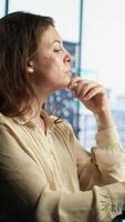 Vertical Woman general director managing multiple expansion projects, showcasing her multitasking abilities, organizational and leadership skills. CEO working with commitment to business success. Camera A. video