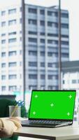 Vertical Woman chief executive officer working with mockup copy space screen on device, developing a project for enterprise growth and objectives achievement. Female director with determination. Camera B. video