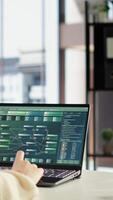Vertical Business leader and trader searching for a new investment solution, examining trading risks and opportunities for company development. Female CEO planning finances and doing research. Camera B. video