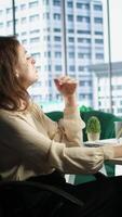 Vertical Young entrepreneur with leadership skills creates a financial report, demonstrating her expertise in analysis, forecasting and ensuring the company stability. Strategic thinking in office. Camera A. video