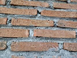 Brick background texture on the wall of the house. photo