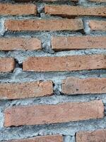 Brick background texture on the wall of the house. photo