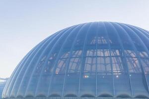 modern architecture, large translucent dome against the sky photo