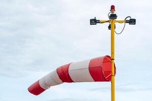windsock, meteorological, instrument that used as an indicator of wind speed and direction photo
