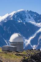 astronomical observatory in high mountainous terrain photo