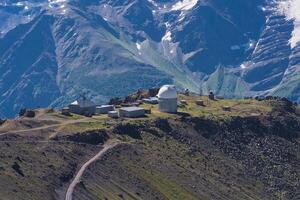 astronomical observatory in high mountainous terrain photo