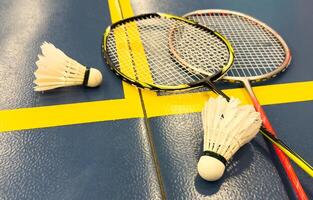 Racket and Shuttlecock with use sport or exercise on a black background. photo