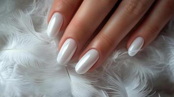 Glamour woman hand with luxury white color nail photo