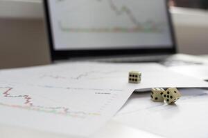 Dices cubes to trader. Cubes with the words SELL BUY on financial chart as background. Selective focus photo