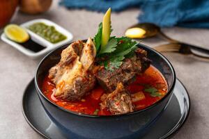 Soto Tangkar is Betawi food. The name Tangkar itself is a term for beef ribs in Betawi language. Soto Tangkar cooked in thin coconut milk soup spiced with red curry. photo