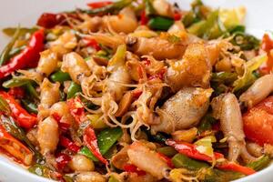 Spicy Stir Fried Squid or Tumis Cumi Pedas is Indonesian traditional food, especially in javanese. photo