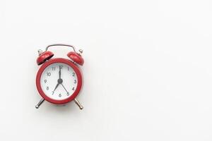 Time concept - website banner of a retro red alarm clock photo