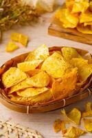 Breadfruit chips or Keripik sukun are food made from breadfruit which is thinly sliced and then fried until dry and crispy. It tastes salty and is usually given a savory onion aroma. photo