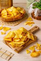 Breadfruit chips or Keripik sukun are food made from breadfruit which is thinly sliced and then fried until dry and crispy. It tastes salty and is usually given a savory onion aroma. photo