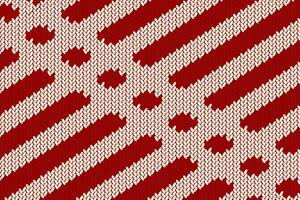 Knitted fabric texture with rhombus ornament on red background vector