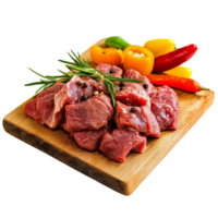 Fresh cuts of beef with vibrant vegetables on a wooden board, transparent png