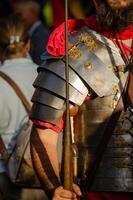 armor lorica segmentata of the roman legion, in an act of historical recreation. Festa dos Povos. Chaves, northern Portugal photo