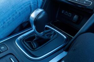 detail of the gear shift lever on a car photo
