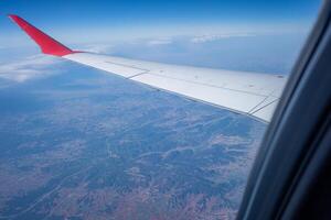 view from the window of an airplane in flight photo