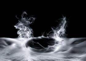 Real smoke exploding and swirling outwards. Dramatic smoke or fog effect for spooky Halloween or other dramatic background. photo